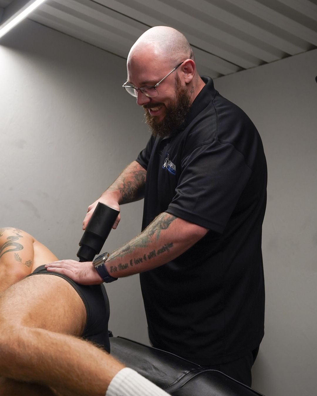 Kieran Chapman, physiotherapist, treating a patient